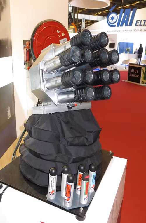 Một hệ thống súng phóng lựu tự động được giới thiệu tại Milipol-2015, nó có cỡ nòng 38mm và chủ yếu sử dụng các loại đạn không gây sát thương với tầm bắn hiệu quả từ 50m đến 210m.