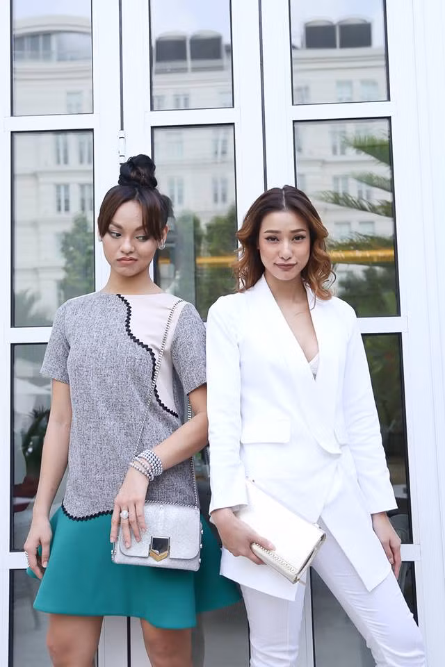 Mai Ngô diện váy suông khá giản dị còn LiLy Nguyễn thanh lịch nhưng không kém phần sexy với bộ suit trắng lộ nội y. Ảnh: FBNV.