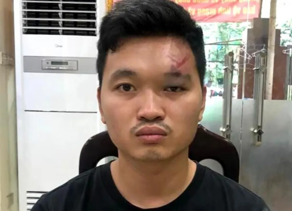 Ha Noi: Bat nam thanh nien vao chung cu trom IC xe may tay ga