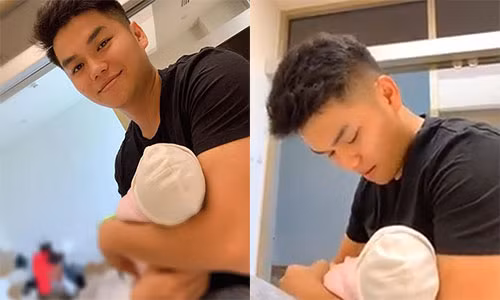 Chong tre Le Phuong vua om con moi sinh vua luyen hat