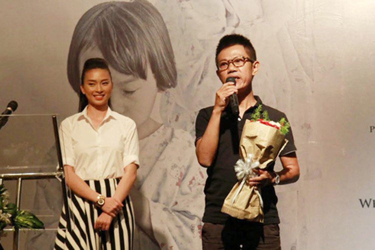 Ngô Thanh Vân còn vướng tin đồn tình cảm với nhạc sĩ Quốc Bảo. Lúc đó, cuộc hôn nhân của Quốc Bảo gặp trục trặc. Ảnh: VTV