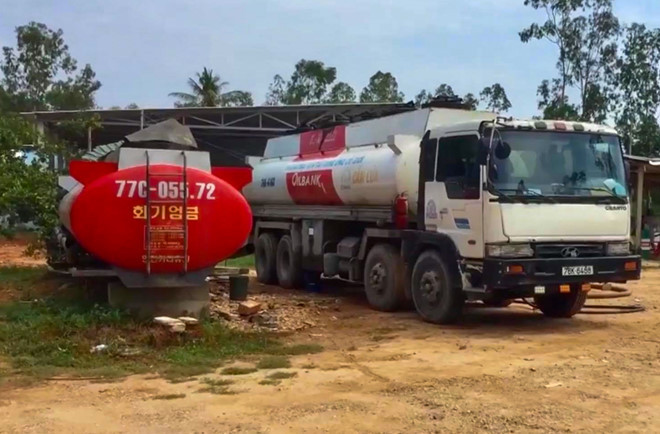 Bat hai giam doc doanh nghiep lien quan vu ban dau DO gia-Hinh-2