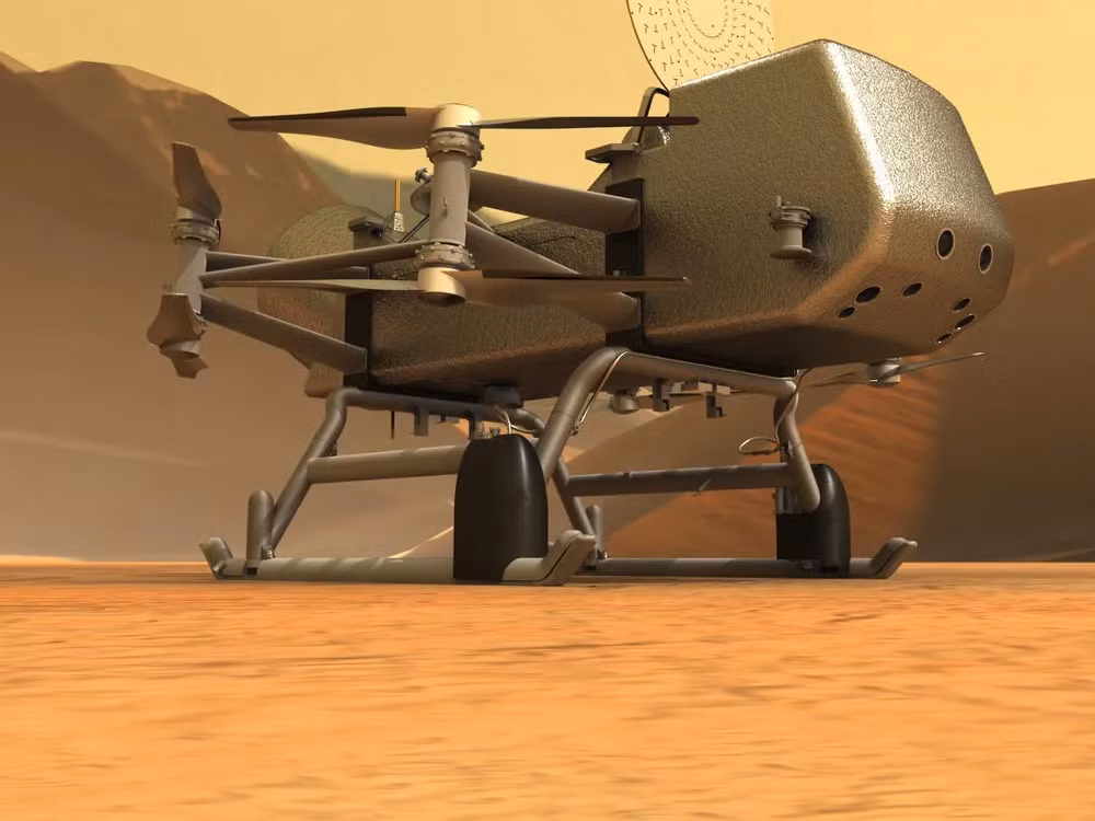 Thiết bị bay tự hành sử dụng năng lượng hạt nhân sẽ thực hiện sứ mệnh kéo dài 2,5 năm, khám phá bề mặt Titan và nghiên cứu khí quyển, địa chất, hóa học của mặt trăng này.(Ảnh:Smithsonian Magazine)