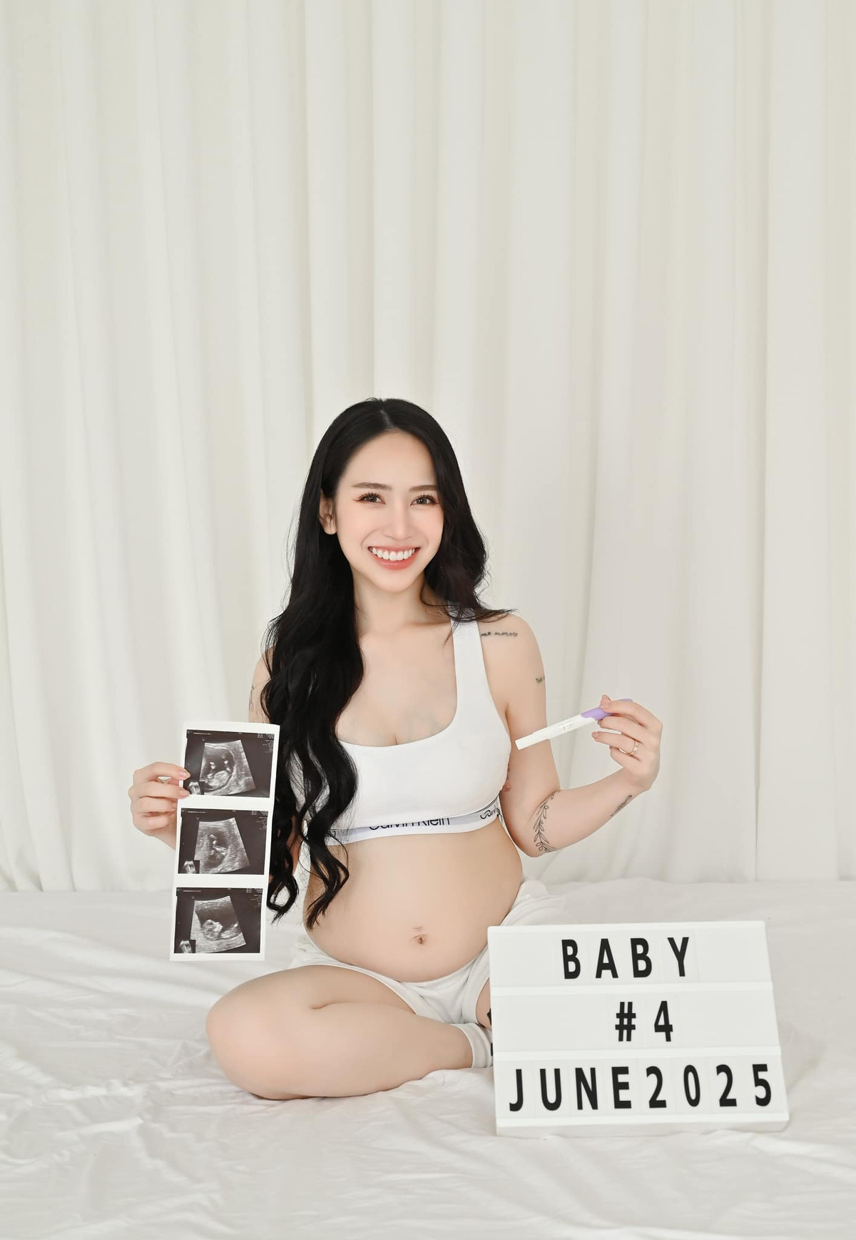 Ái nữ đại gia ngành nhựa rạng rỡ trong bộ ảnh thông báo có nhóc tì thứ 4.