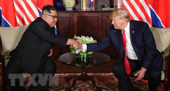 Tổng thống Mỹ Donald Trump và nhà lãnh đạo Triều Tiên Kim Jong-un. (Nguồn: THX/TTXVN)