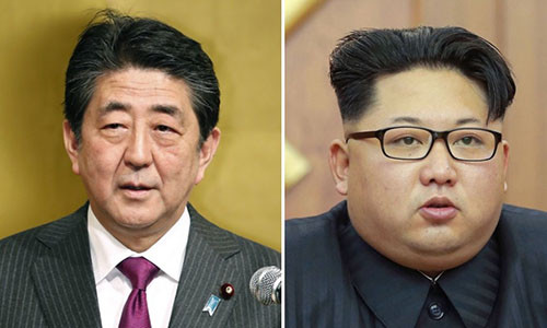 Thủ tướng Nhật Bản Zhinzo Abe (trái) và nhà lãnh đạo Triều Tiên Kim Jong-un. Ảnh: Kyodo News.