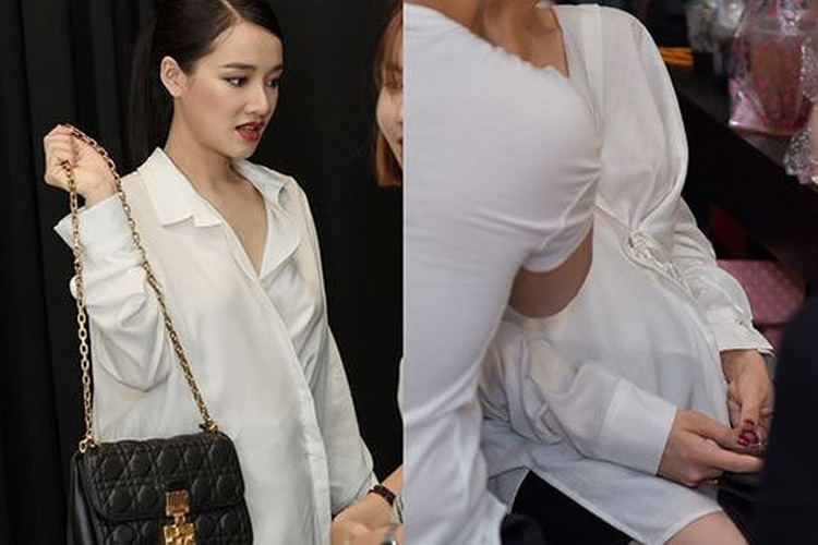 Dù mặc trang phục rộng nhưng Nhã Phương vẫn không thể giấu được vòng hai lùm lùm. Ảnh: Vietnamnet