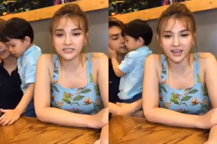 Giữa ồn ào, Kin Nguyễn thanh minh anh kéo tay bé Henry thì lỡ trúng vào cạnh bàn. Ảnh: Thời đại plus