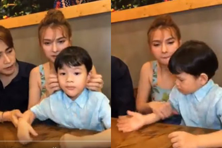 Cư dân mạng đang ném đá chồng Thu Thuỷ bị tố bạo hành con riêng của vợ. Cụ thể, Kin Nguyễn vướng nghi vấn lén cấu tay con trai của Thu Thủy dưới gầm bàn khi livestream. Ảnh: Thời đại plus