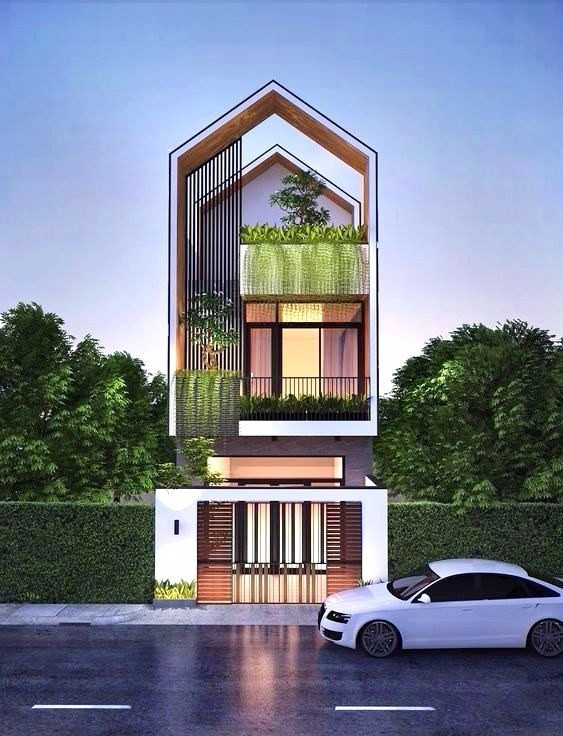 Vẻ đẹp hiện đại của căn nhà đến từ sự phá cách trong kiến trúc. Tầng 2 và tầng 3 thiết kế thành một khối, nối với nhau bởi một hệ lam chạy dọc thẳng