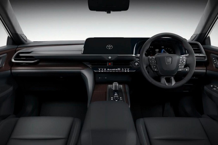 Nằm giữa 2 cụm đèn pha là khe gió hẹp, tích hợp hộp chứa cảm biến của các hệ thống an toàn chủ động ADAS. Chưa hết, thế hệ mới của "xe bộ trưởng" còn có lưới tản nhiệt hình lục giác cỡ lớn với những nan nằm dọc màu đen theo phong cách thác nước. Phía dưới lưới tản nhiệt là hốc gió trung tâm hình thang ngược với viền mạ crôm, kéo dài đến khe gió giả nằm dọc ở hai góc cản trước.