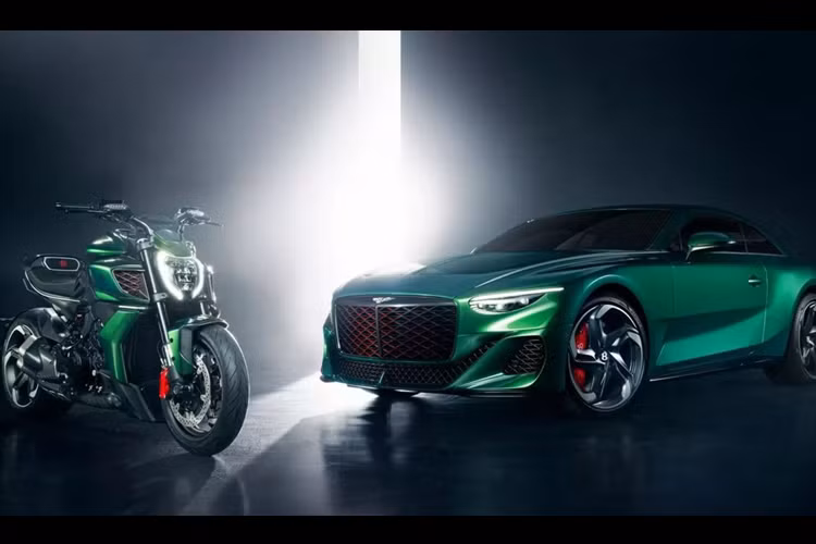 Ducati là công ty con của Lamborghini, và Lamborghini là một phần của Audi. Như chúng ta đã biết, Audi là một phần của tập đoàn Volkswagen, trong đó có cả Bentley. Và đó là lý do tại sao hãng môtô Ý Ducati bắt tay Bentley siêu sang của Anh quốc.