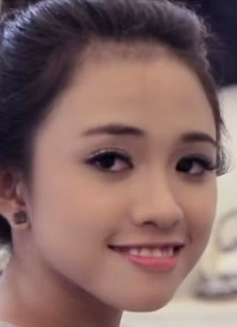 Hàm răng không đều ở quá khứ là nhược điểm khiến Thiên Nga kém xinh hơn thời điểm hiện tại rất nhiều.