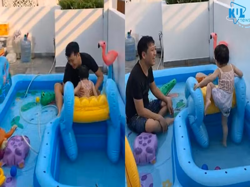 Khoảnh khắc "Mười Khó" nghịch nước cùng con gái trên sân thượng trong bể bơi bằng phao.