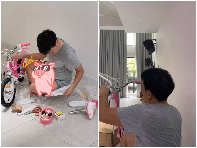 Ông xã của Nhã Phương chăm chú lắp chiếc xe đạp để con gái chơi vào dịp Lễ tình nhân.