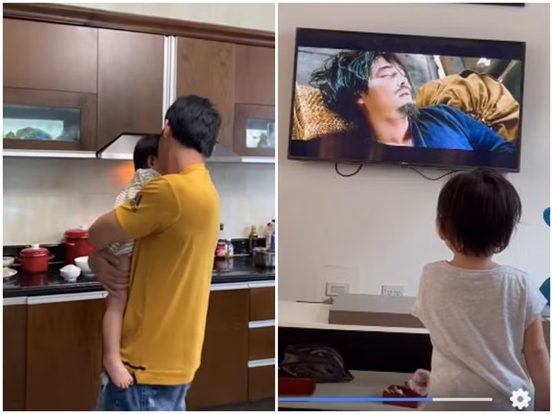 Quách Ngọc Ngoan đăng tải clip vừa nấu ăn vừa ru con và khoảnh khắc bé Thanh Nhã thích thú xem phim bố đóng.