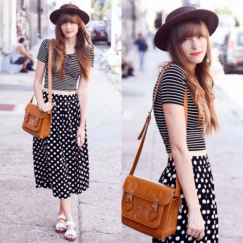 Nếu muốn một chút phá cách cho thời trang dạo phố thì một chiếc áo thun crop top và chân váy maxi chấm bi cùng tông màu đen trắng sẽ là gợi ý thú vị dành cho bạn trong hè này.