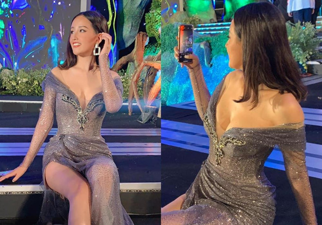 Bộ đầm hở trên ngắn dưới với đường khoét ngực sâu táo bạo khiến Mai Phương Thúy suýt lộ vòng 1 trên sóng trực tiếp.