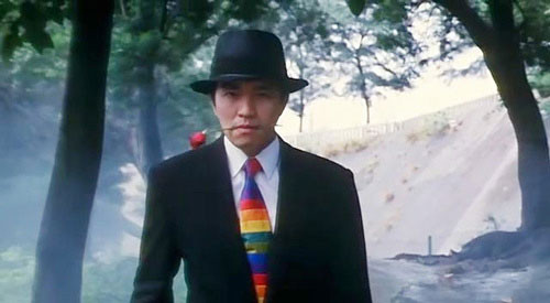 Tạo hình nhân vật điệp viên 007 do Châu Tinh Trì thủ vai trong Quốc sản 007 (1994).