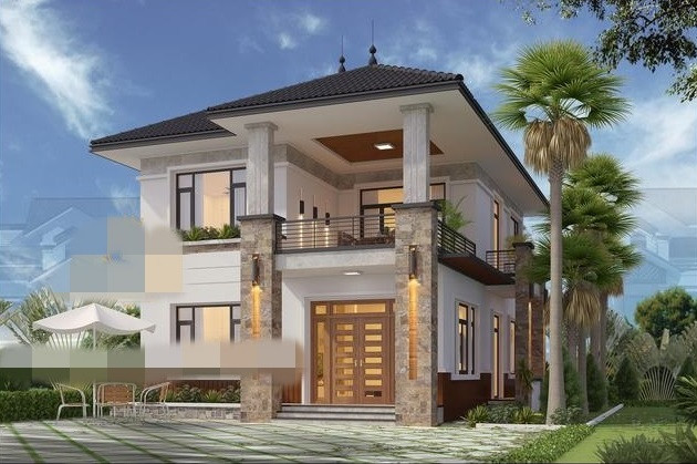 Trên khu đất rộng, ngôi nhà 2 tầng mái Nhật được xây trên diện tích 130m2. Xung quanh nhà là không gian cây cối thoáng đãng. Ảnh: Thietkenhadepmoi