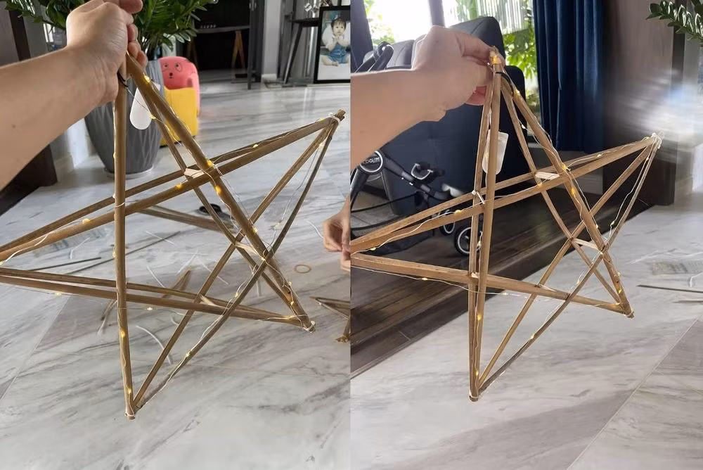 Theo đó, đại gia phố núi cùng vợ tự tay làm lồng đèn cho bé Suchin. Ảnh: FBNV