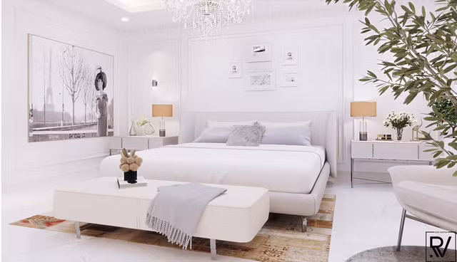 Phòng ngủ với tông trắng chủ đạo giúp mở rộng thêm không gian. Ảnh: FBNV