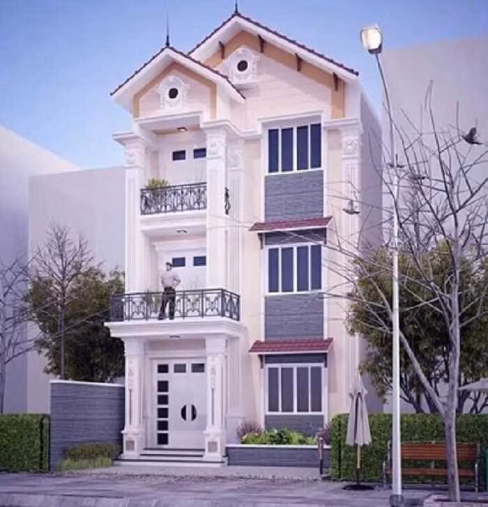 Không rập khuôn như mẫu nhà ống hiện đại thường thấy, công trình này chọn phong cách tân cổ điển với cột trụ vững chắc và những đường nét hoa văn trang trí sang trọng. Ảnh: Kientruccuonggiahieu.