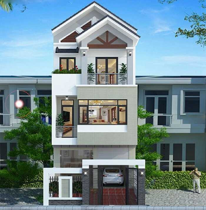 Ngôi nhà với tông màu trắng chủ đạo kết hợp với hệ cổng và cửa kính viền đen nổi bật, mảng tường được ốp đá màu xám nhẹ trang nhã. Ảnh: Xaydungankhang