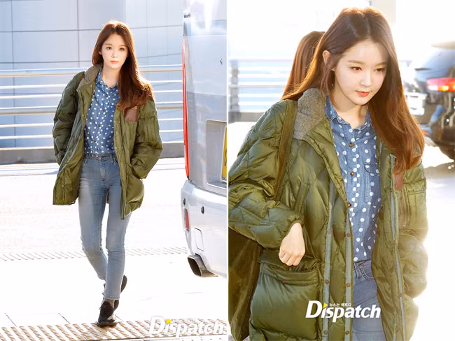 Kang Min Kyung giản dị với quần jeans, áo khoác màu bộ đội, lặng lẽ khi xuống sân bay Hong Kong.