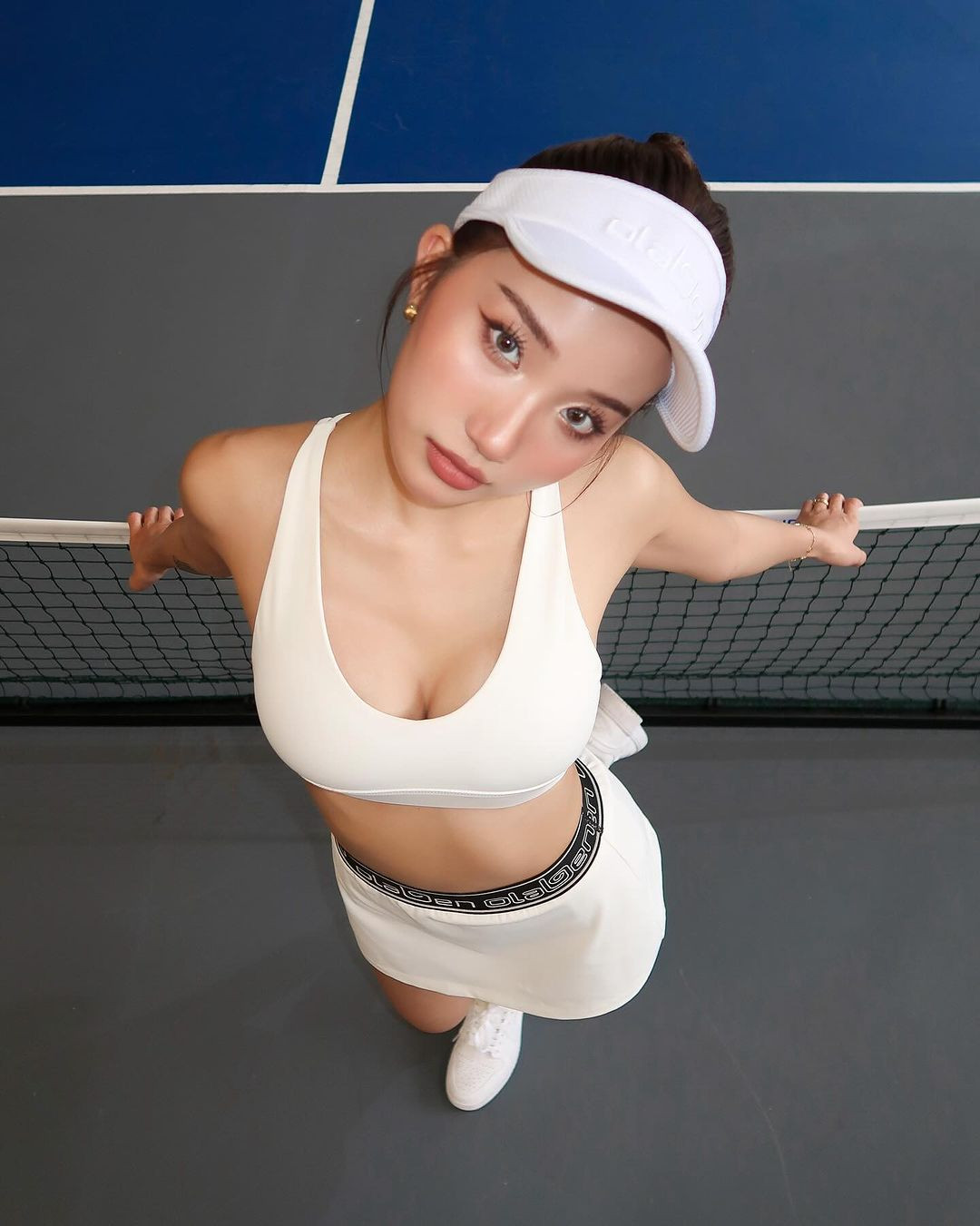 Không chỉ toát mồ hôi với Pickleball, hot girl TikTok này còn tranh thủ chụp bộ ảnh thời trang để khoe mình đã nhập môn.