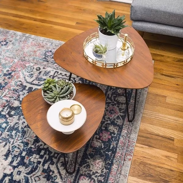 Cai tao phong khach cu ky voi loat mau ban ca phe doi sang tao