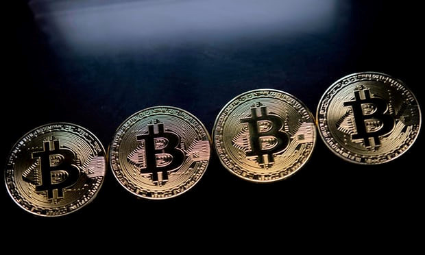 Các vụ tấn công mạng tống tiền thường mã hóa máy tính và buộc nạn nhân trả tiền bằng bitcoin. Ảnh: Getty Images.