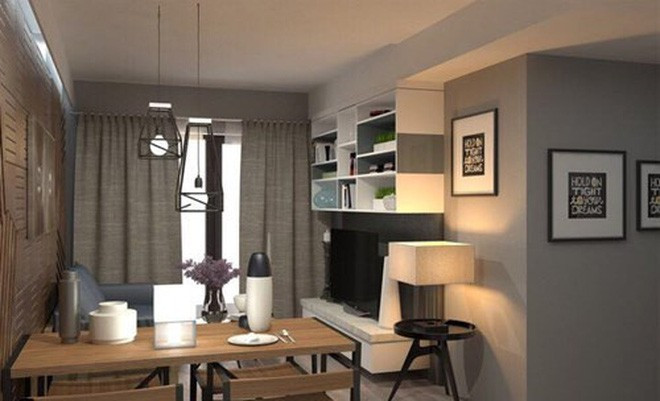 Để tận dụng không gian và lưu trữ gọn gàng, tường phòng khách còn có một chiếc kệ lớn nhiều ngăn.