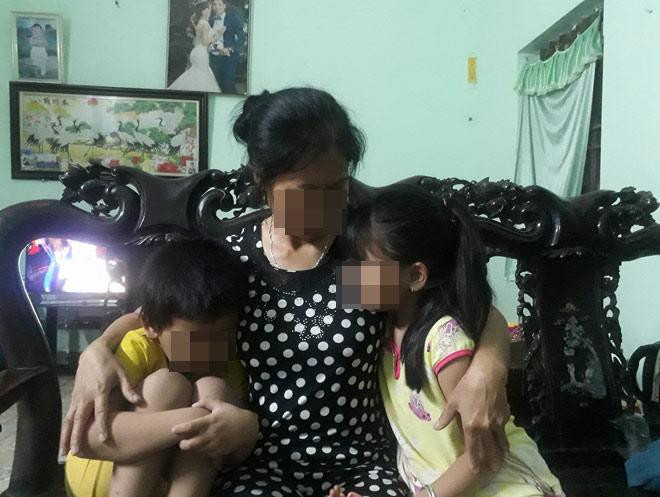 Bà Ngân và hai đứa cháu đáng thương.