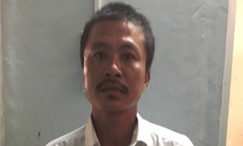 Đối tượng Khổng Minh Trí tại cơ quan công an. Ảnh: PLO.