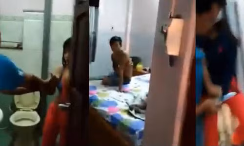 Bị bắt quả tang tại trận khi đang vào khách sạn với người tình trẻ, cô vợ chẳng những không hối cải mà còn dùng dao chém chồng - Ảnh chụp từ clip