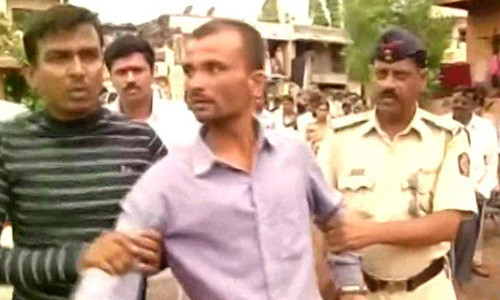 Người cha tàn nhẫn khi bị bắt giữ.