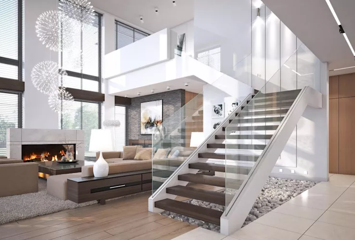 9. Trang trí theo thang nổi Cầu thang nổi là thiết kế bạn không thể không mê vì nó giúp không gian phòng thêm rộng rãi. Để trang trí khu vực dưới cầu thang này bạn nên đặt sỏi trên mặt đất và có thể thêm cây cọ nhỏ.