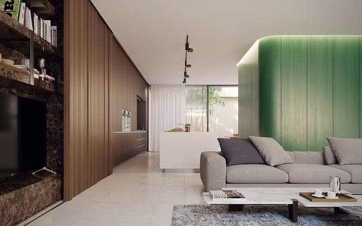 Sử dụng đồ nội thất thấp cùng cách trang trí sàn và trần màu trắng giúp đẩy xa khoảng cách hai khu vực này khiến căn nhà lúc nào trông cũng rộng và thoáng.