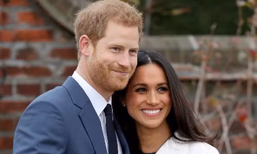 Hoàng tử Anh Harry (trái) và hôn thê Meghan Markle hóa ra lại là họ hàng "rất xa". Ảnh: Chris Jackson.