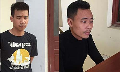 Nguyễn Văn Tý (trái) và Lê Quốc Long (phải) tại CQĐT.