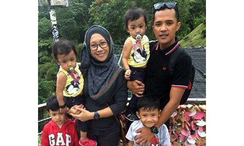 Hai vợ chồng anh Muhammad Arif Shuhery và chị Nur Arissa Ruri Ahon bên các con. (Ảnh: Internet)