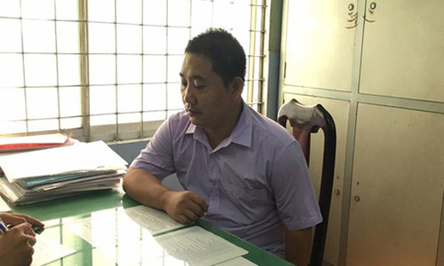 Lê Quang Long lúc bị tạm giữ.