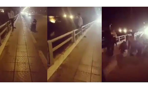 Nam thanh niên có ý định tự tử vì bị người yêu bỏ. (Ảnh cắt từ clip)