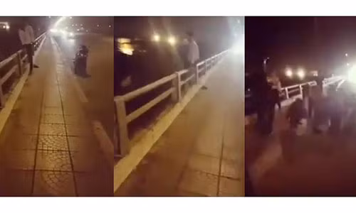 Nam thanh niên có ý định tự tử vì bị người yêu bỏ. (Ảnh cắt từ clip)