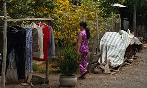 Lối vào nhà của nghi phạm Nguyễn Hữu Tình.