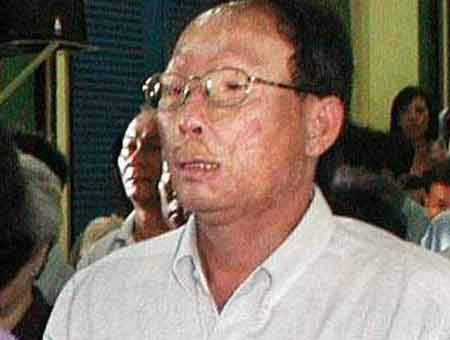 Lâm “Chín ngón” với vết thương trên mặt.