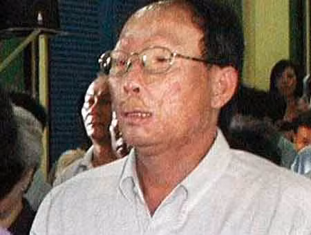 Lâm “Chín ngón” với vết thương trên mặt.