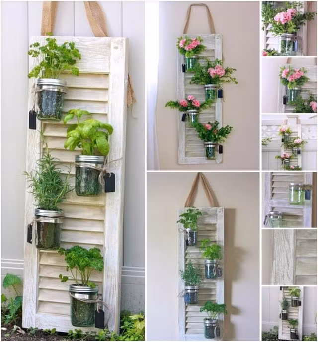 7. Cánh cửa sổ không còn được sử dụng với chức năng chính. Bạn cũng có thể dùng chúng để treo cố định lên tường. Tận dụng lọ thủy tinh để trồng các loại cây hoa, cây gia vị hay cắm những loài hoa mà bạn thích.