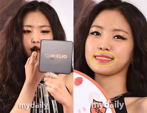 Naeun (Apink) xuất hiện với gương mặt thiếu tự nhiên, răng còn bị dính son đỏ. Gần đây cô nàng làm xôn xao cộng đồng mạng vì tin đồn phẫu thuật thẩm mĩ.